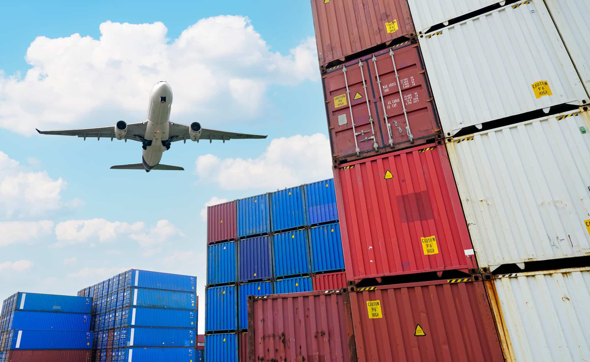 Freight aircraft loading cargo at an international airport